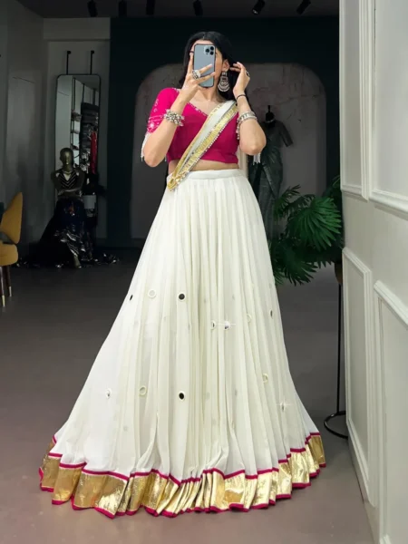 Ivory mirror work lehenga choli with pink unstitched blouse fabric and matching dupatta